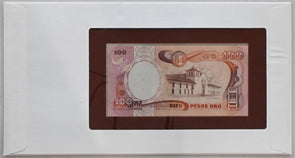 Colombia 1985 100 Pesos (1983) Bank of all nations. 12 Pesos stamp (?) cancelled