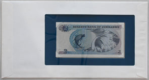 Zimbabwe 1983 2 Dollars (1980) Bank of all nations. 9 Cents Rhino stamp cancelle