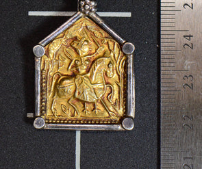 vintage gold pendent with silver embezzle 35mm long and 25mm wide.  Kn BU0321