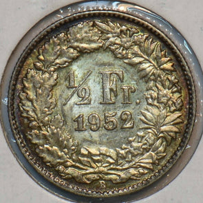 Switzerland 1952 1/2 Franc Choice Toned UNC 490737 combine shipping